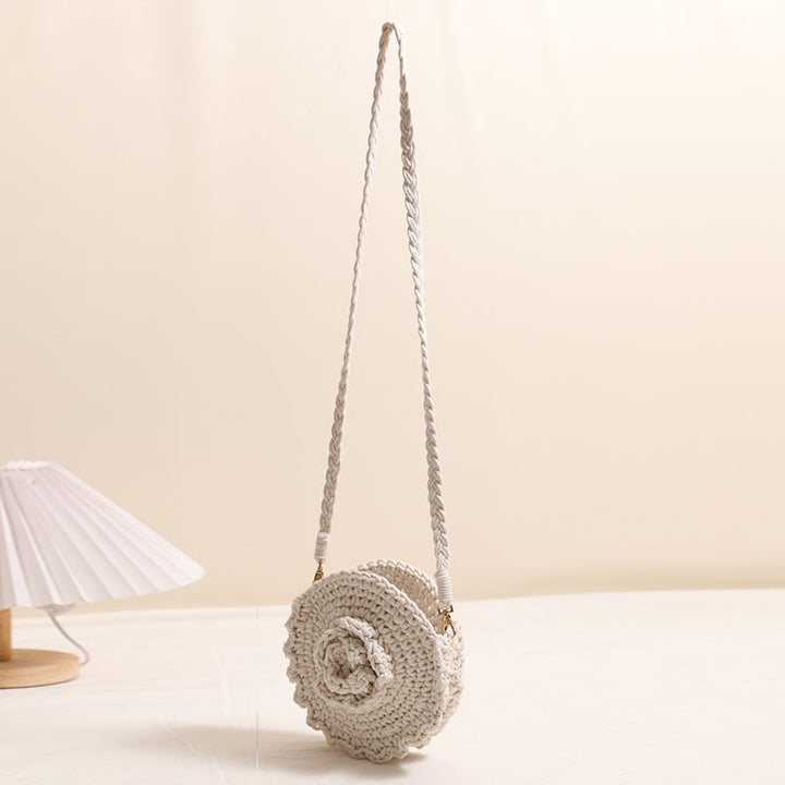 Hand-crocheted crossover bag with floral details Skanto