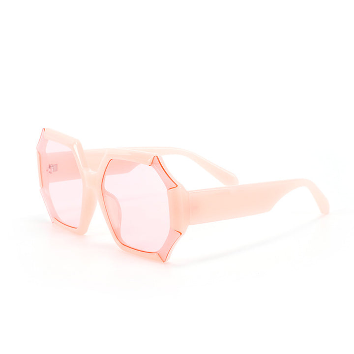 Dame moterelatert solbrille med fasettert ramme Skanto