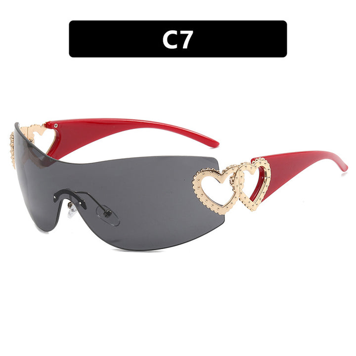 Dame Fashion-solbrille med hjerte-applikasjoner Skanto