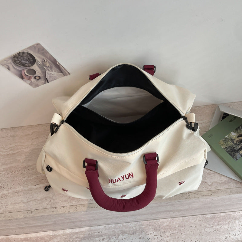 Sporty multifunctional duffel bag with adjustable shoulder strap and sturdy handles Skanto