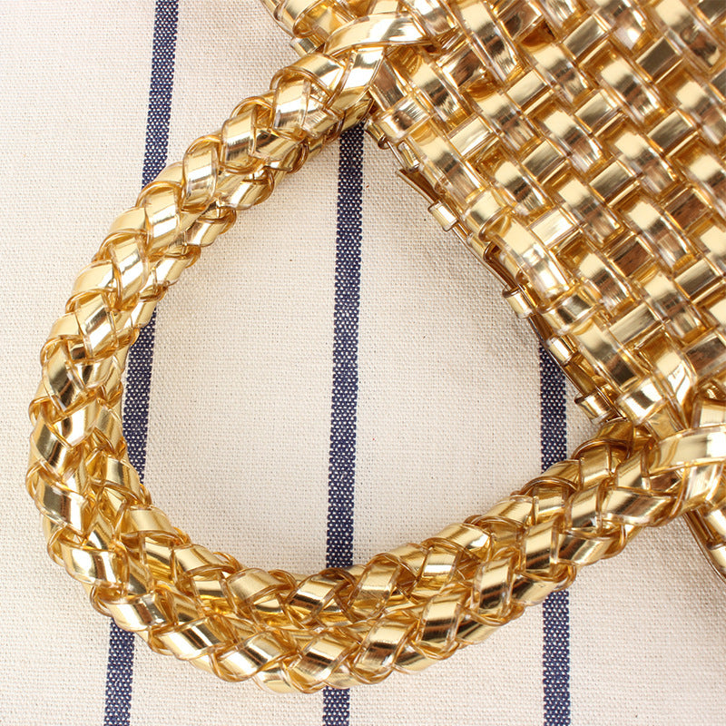 Handbag made of woven natural material with elegant accents Skanto