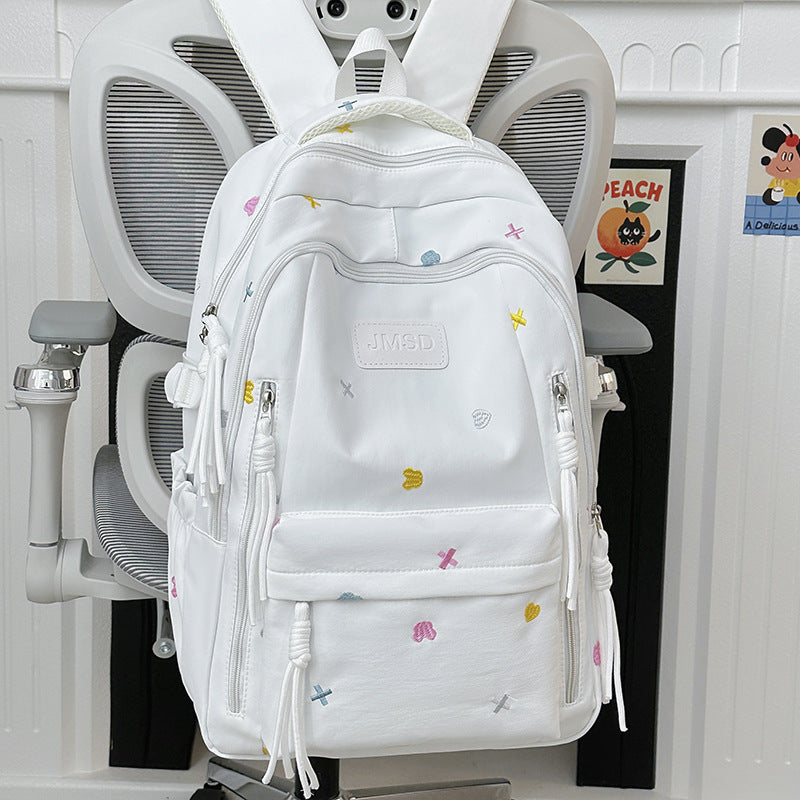 Nydelig brodert trendy skoleveske
