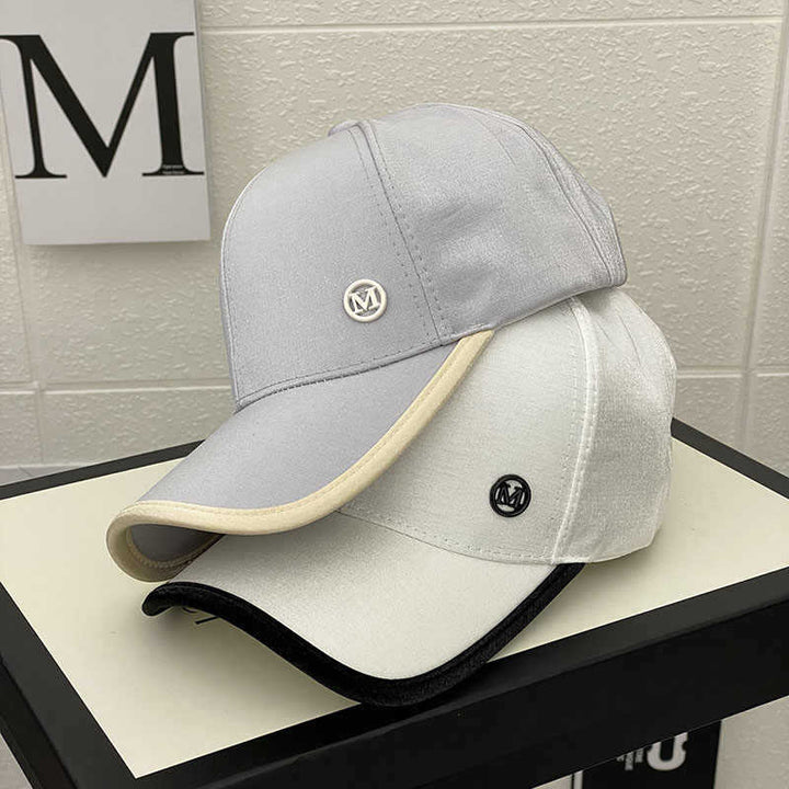 Kvinnenes skinnende sateng baseballcap Skanto