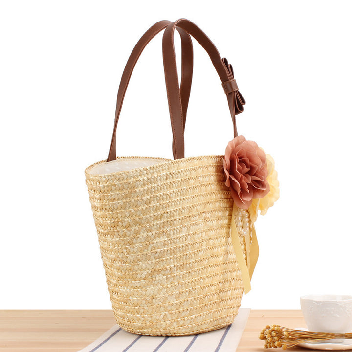 Elegant straw bag with floral motif Skanto