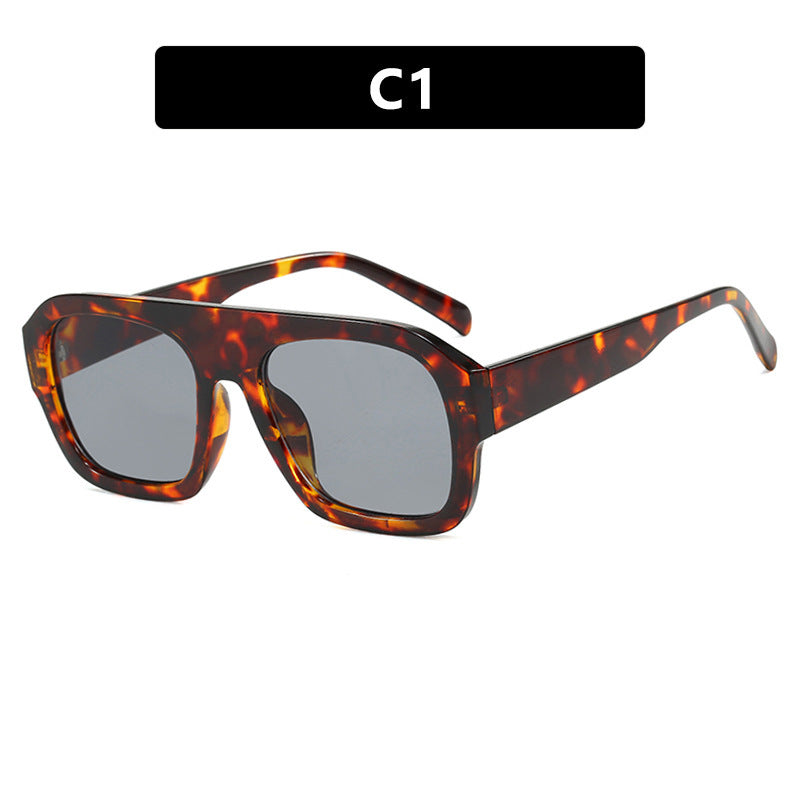 Dame oversized solbrille med markant rektangulært ramme Skanto