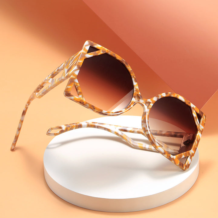 Dame geometrisk solbrille med eksklusiv design og UV-beskyttelse Skanto
