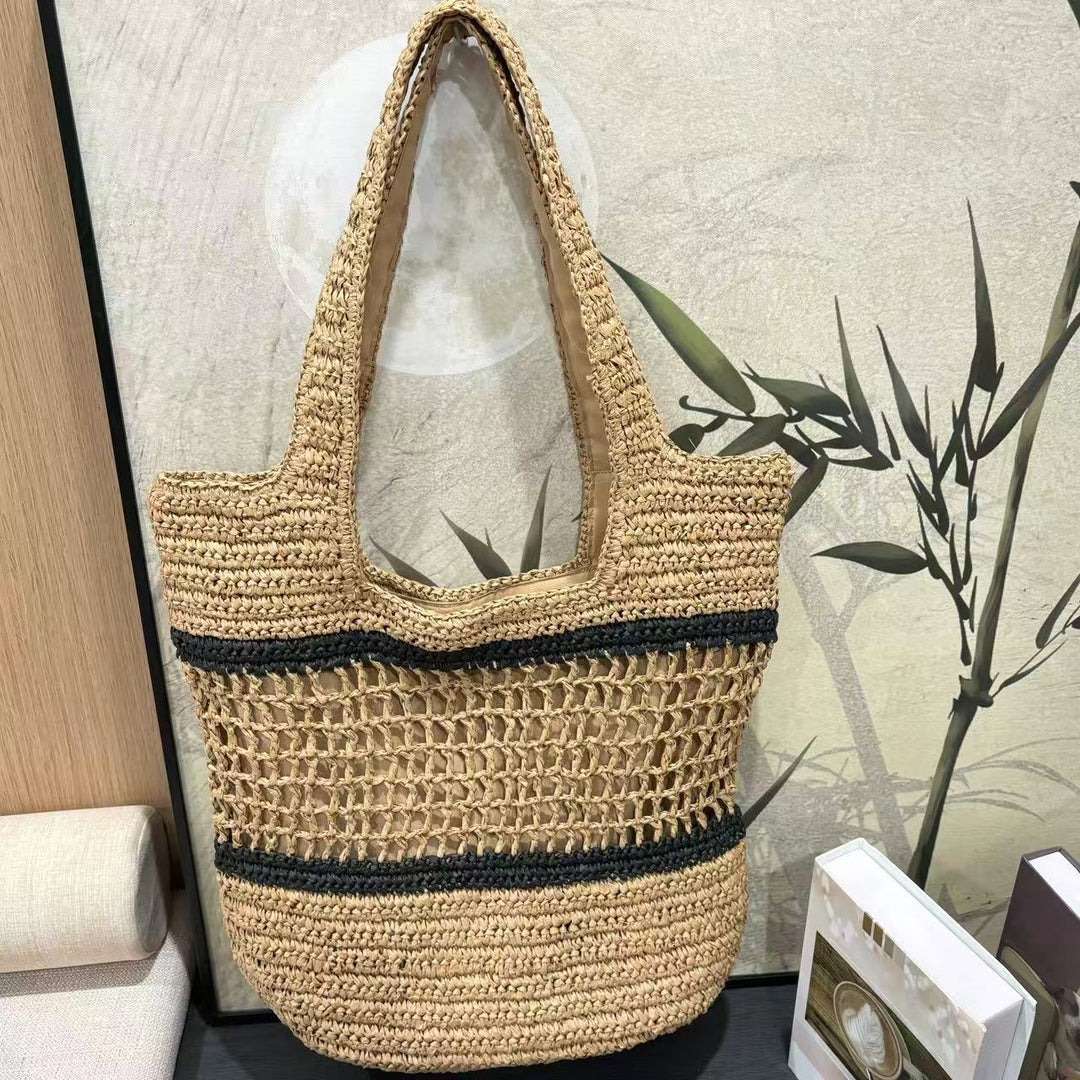 Håndveske laget av flette naturmateriale med elegant struktur Skanto