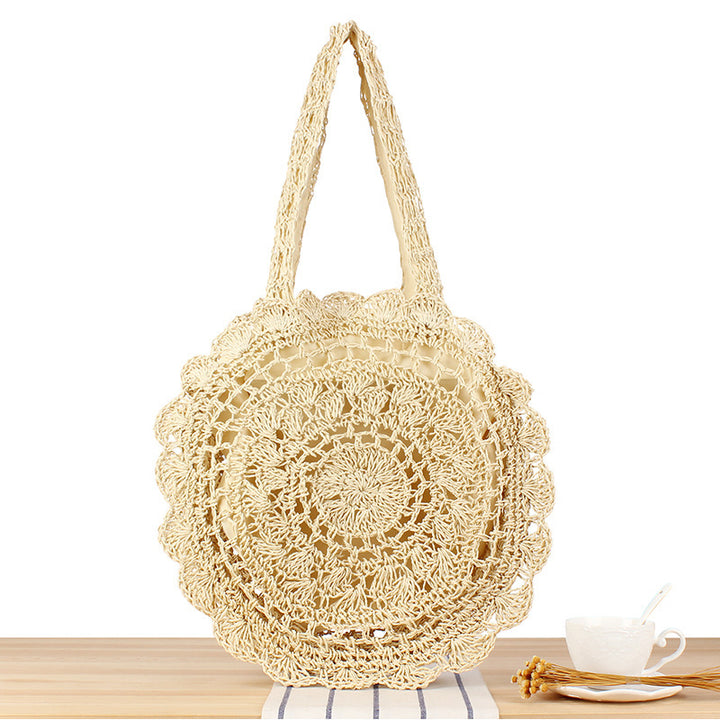 Hand-knotted beach bag with artistic round design Skanto