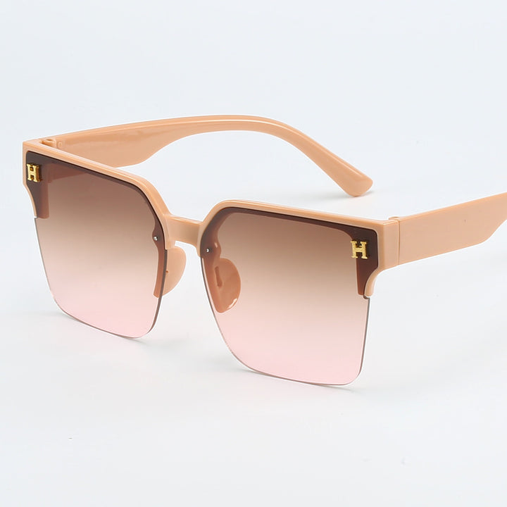 Dame kvadratisk solbrille med elegant metallramme Skanto