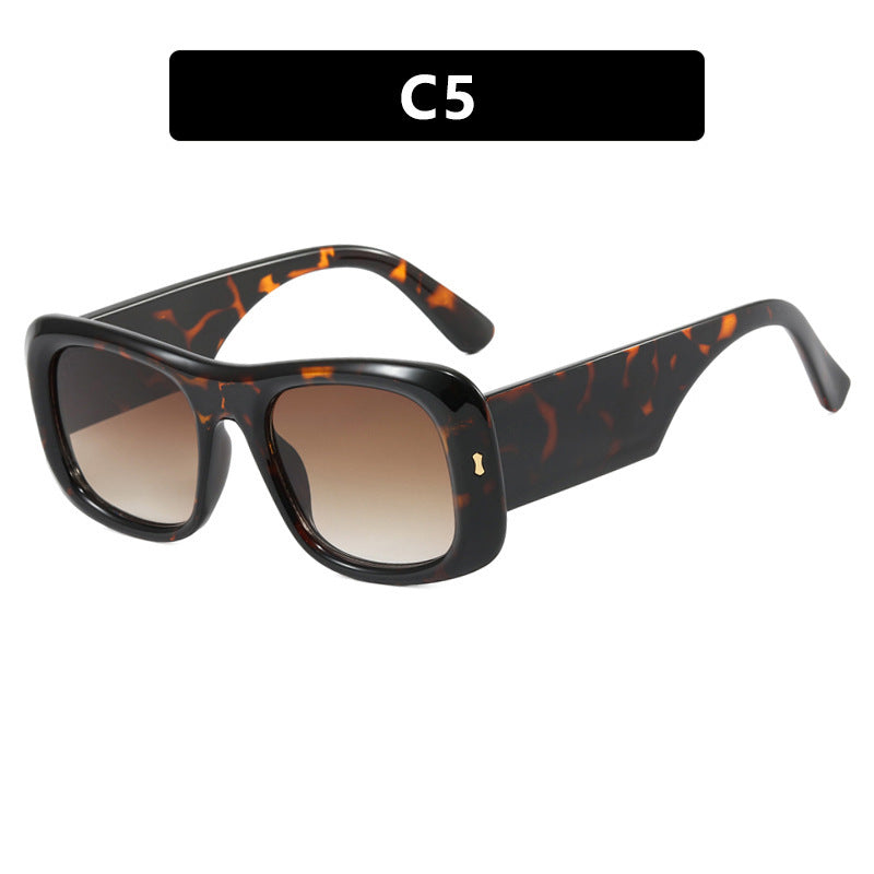 Dame oversized kvadratisk solbrille med bred ramme og polariserte linser Skanto