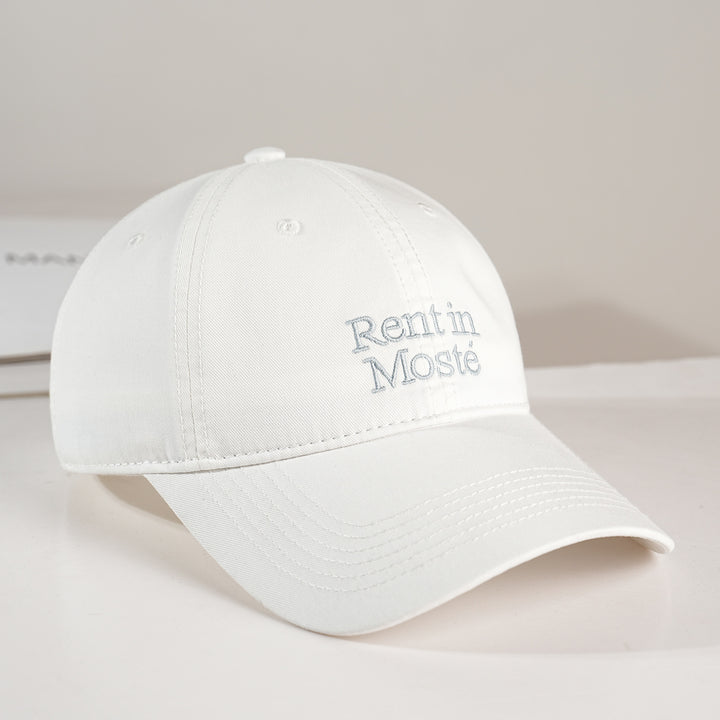 Dame bomull baseball cap med brodert Skanto tekst