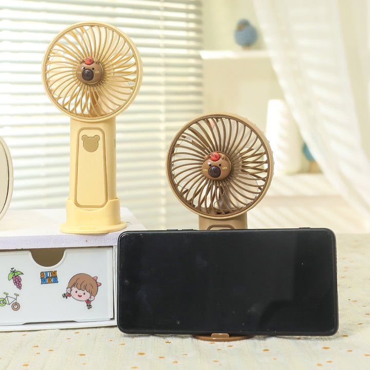 Bærbar håndvifte med USB-ladefunksjon og søtt dyredesign Skanto