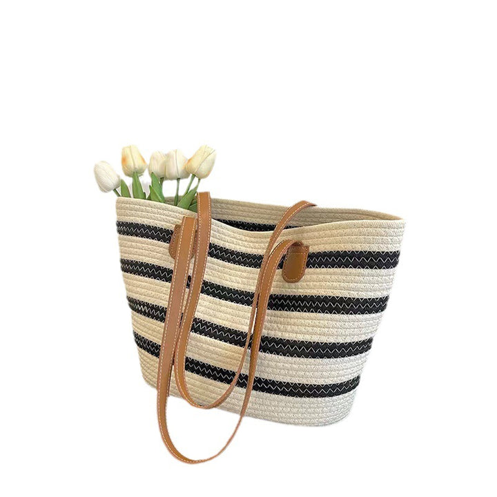 Elegant Tote Bag made of woven raffia with robust leather details Skanto