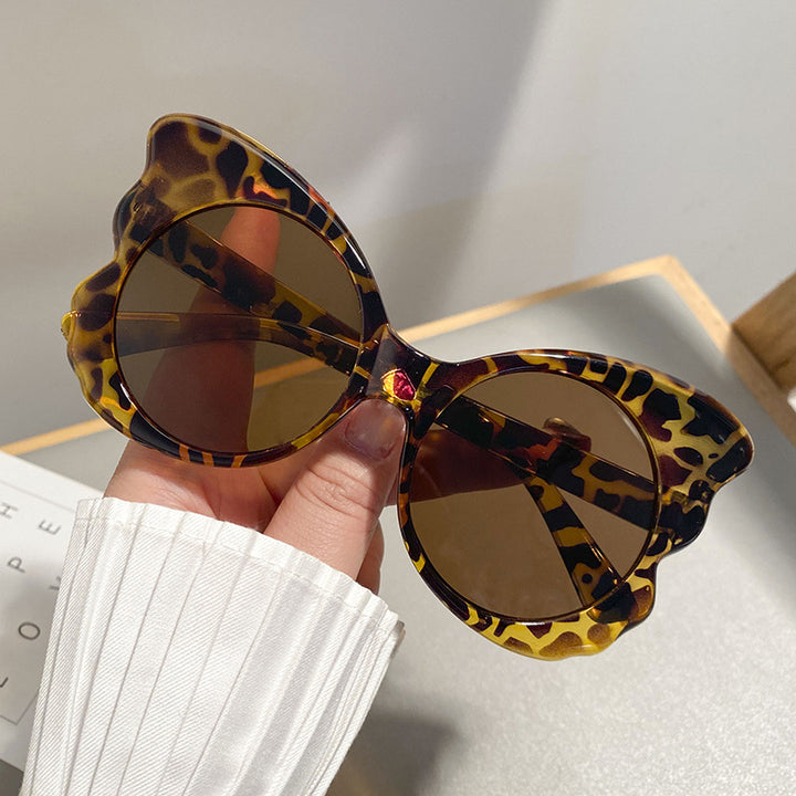 Dame Cat-Eye solbriller med unik rammeform og UV-beskyttelse Skanto