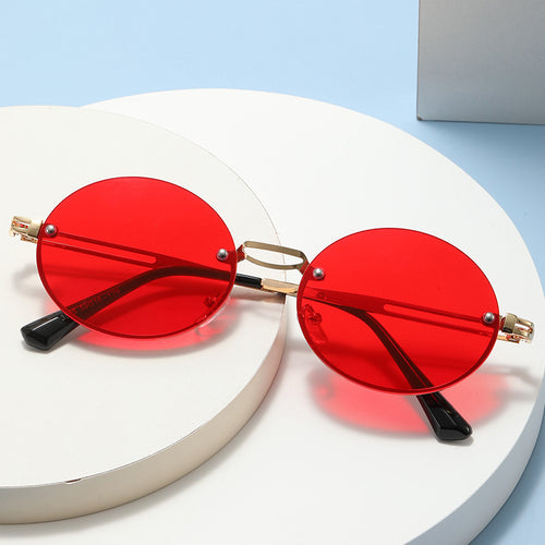 Dame rund solbrille med fin metallramme Skanto