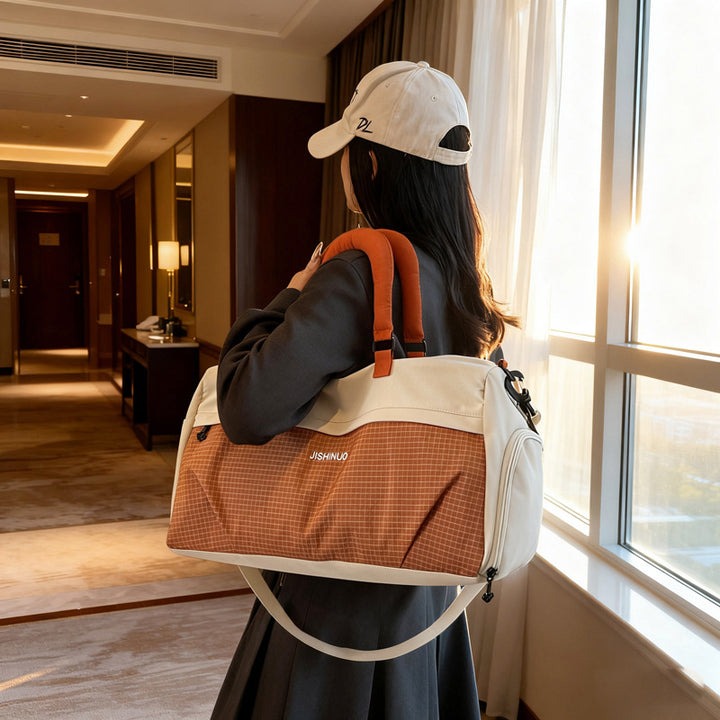 Sporty fritids-duffelbag med ergonomiske håndtak og flere rom Skanto