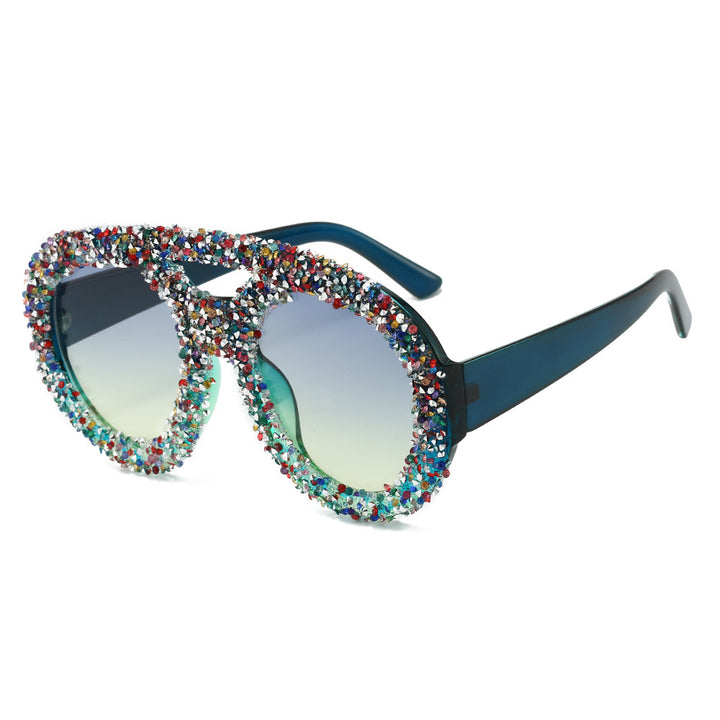 Dame moteriktig solbrille med glamorøse strassramme Skanto