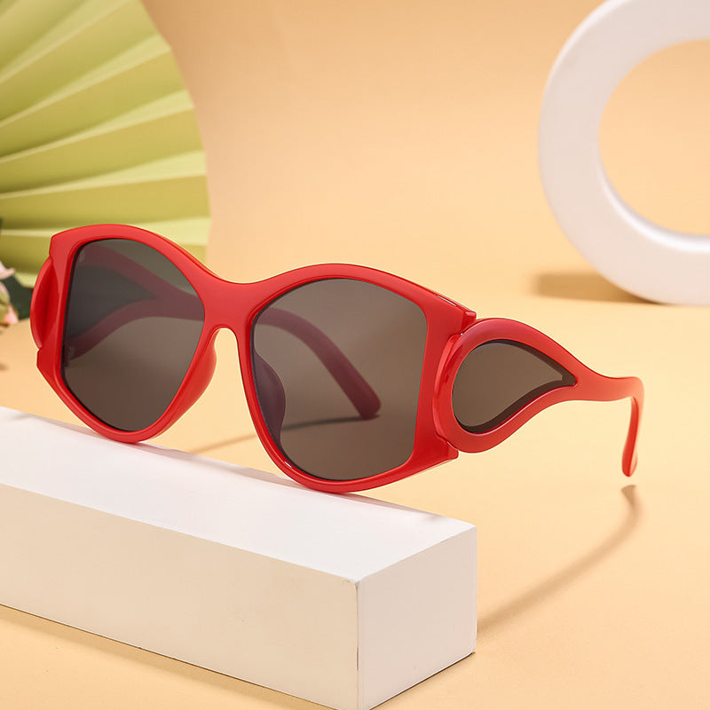 Dame moderne Cat-Eye solbriller med unikt ramme og UV-beskyttelse Skanto