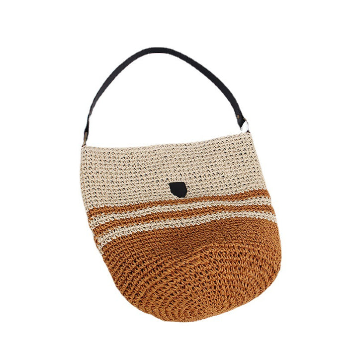 Braided shoulder bag with fashion accent Skanto