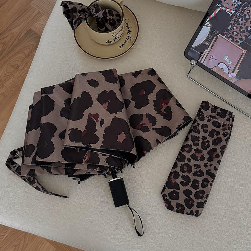 Dame sammenleggbar paraply i moderne leopardmønster Skanto