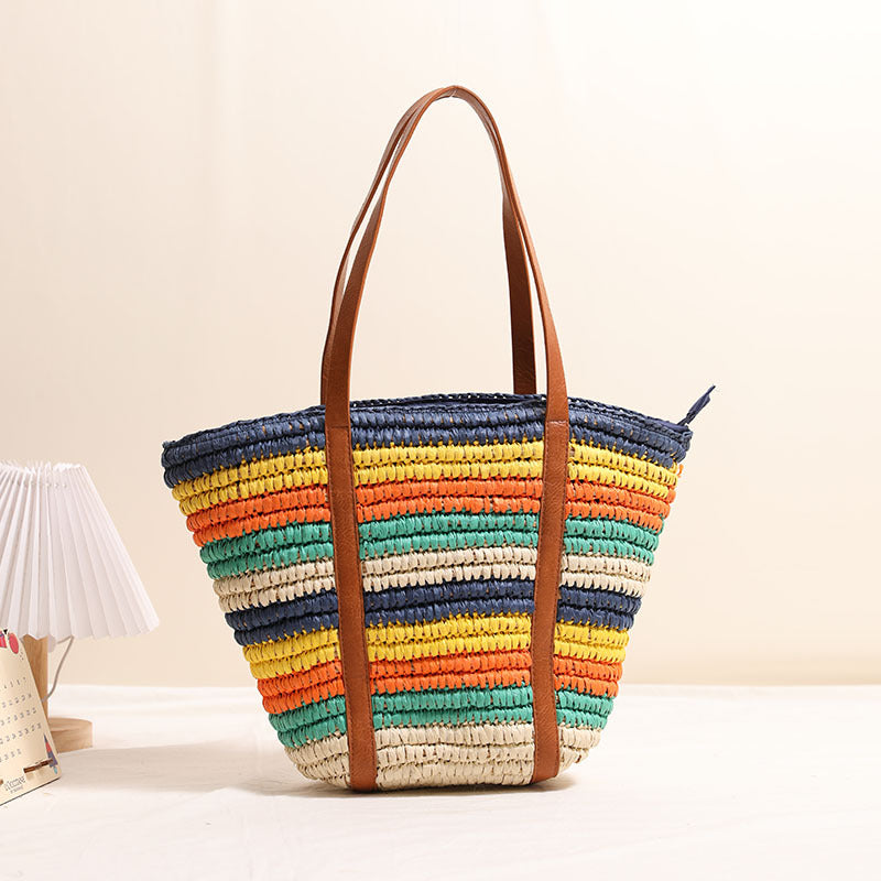 Braided straw bag with sturdy leather handles Skanto
