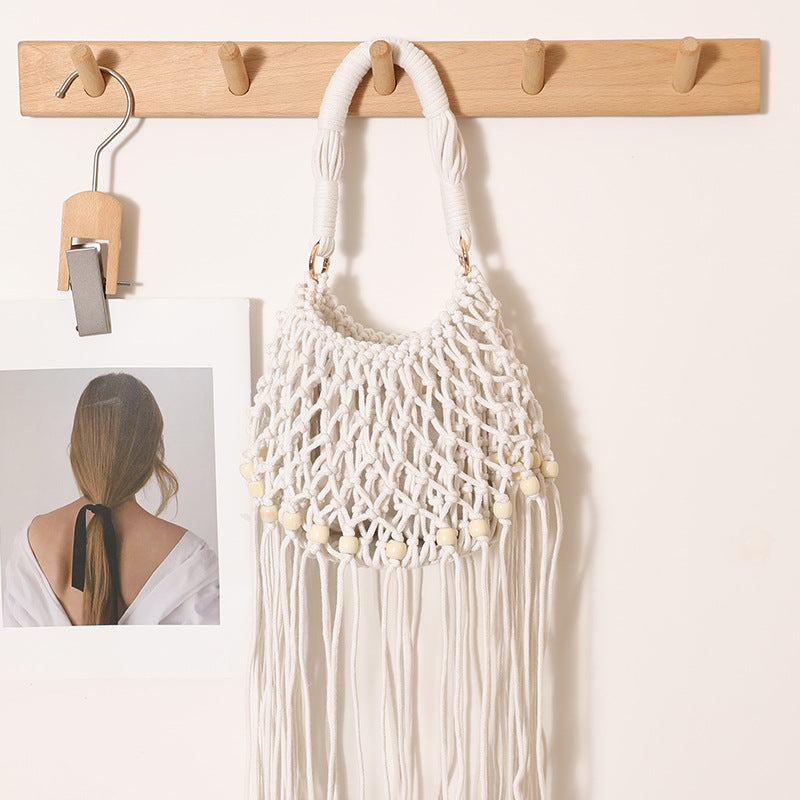 Macrame bag with decorative fringes and wooden beads Skanto