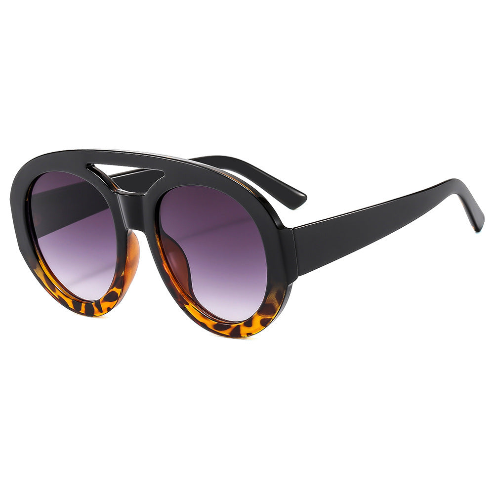 Dame Mote Solbriller i futuristisk oversized-design Skanto