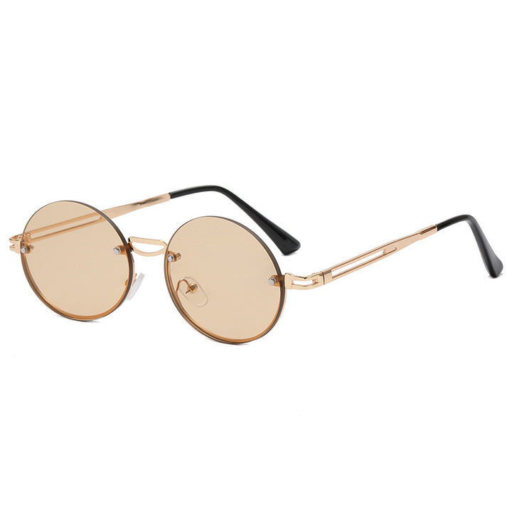 Dame rund solbrille med fin metallramme Skanto