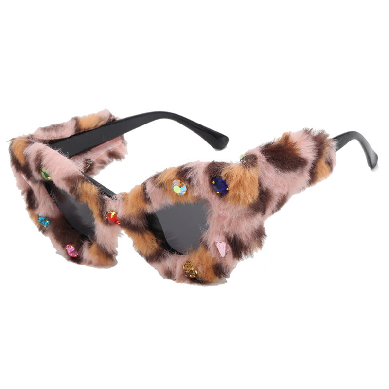 Women's eye-catching, padded sunglasses with decorated frame Skanto