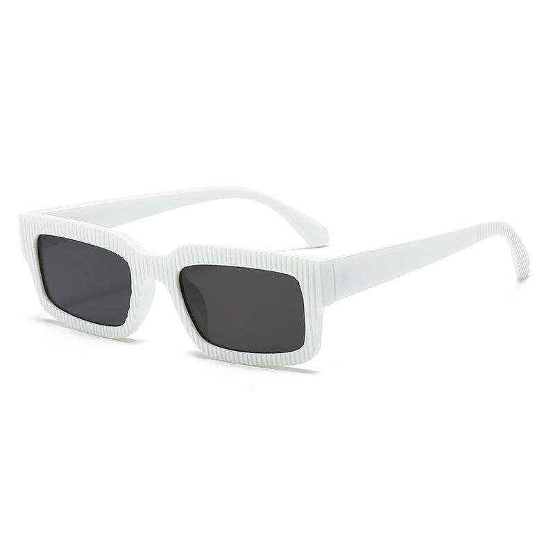 Dame moteriktig solbrille med geometrisk ramme Skanto