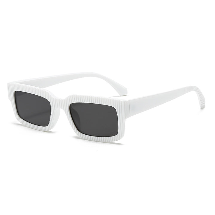 Dame moteriktig solbrille med geometrisk ramme Skanto