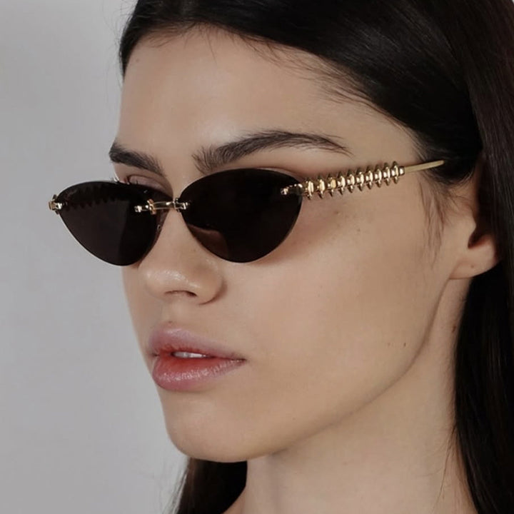 Women's sunglasses in modern, geometric design with stylish metal frame and UV protection Skanto