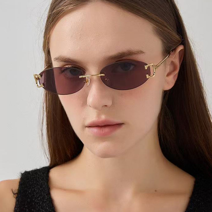 Women's elegant oval sunglasses with modern metal frame Skanto