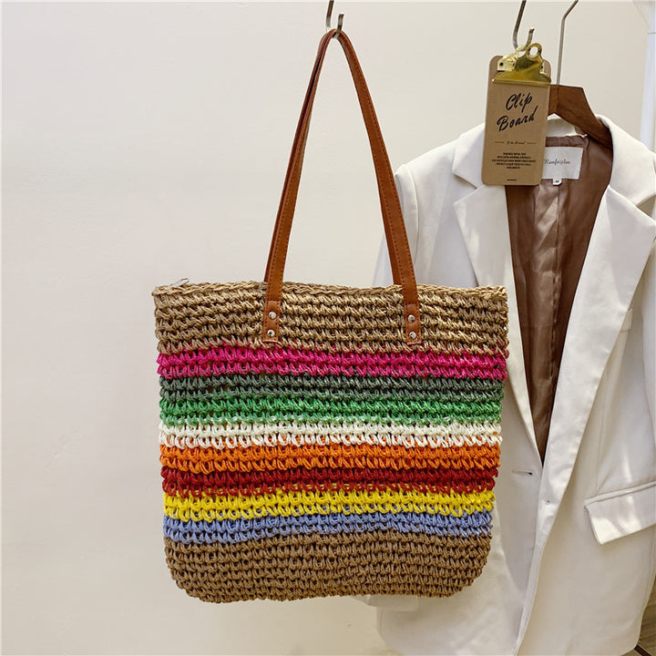 Håndlaget strandveske med fargerikt stripe mønster Skanto