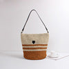 Braided shoulder bag with fashion accent Skanto