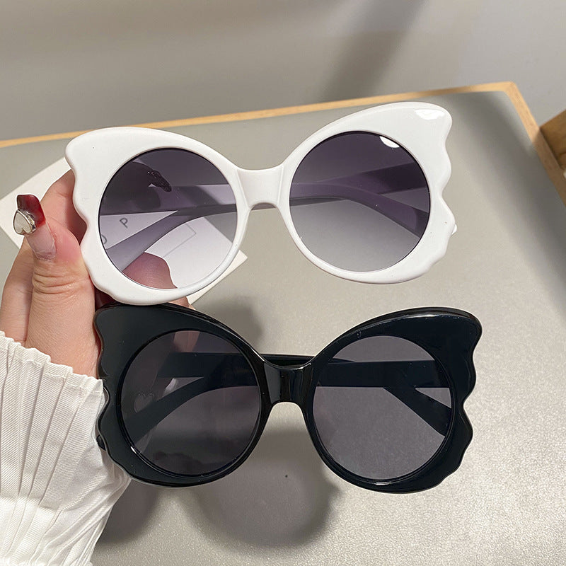 Dame Cat-Eye solbriller med unik rammeform og UV-beskyttelse Skanto