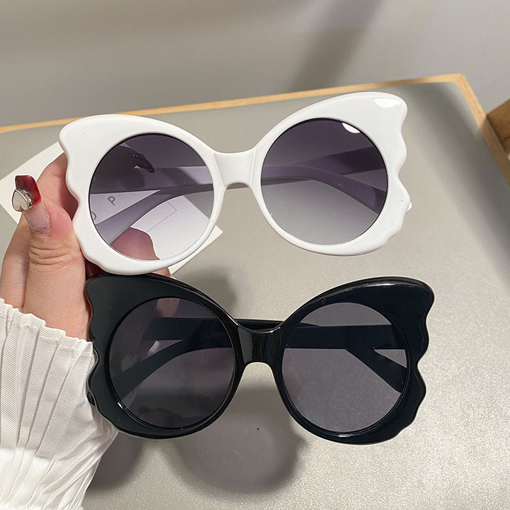 Dame Cat-Eye solbriller med unik rammeform og UV-beskyttelse Skanto