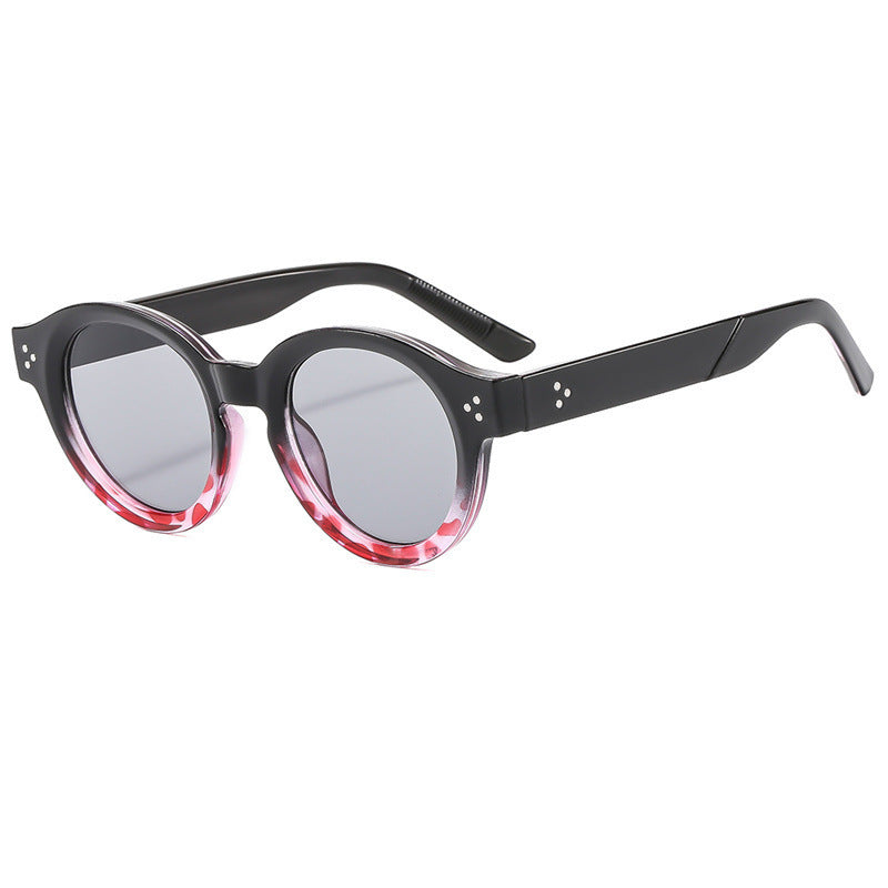 Dame moteriktig solbrille med klar og strukturert ramme Skanto