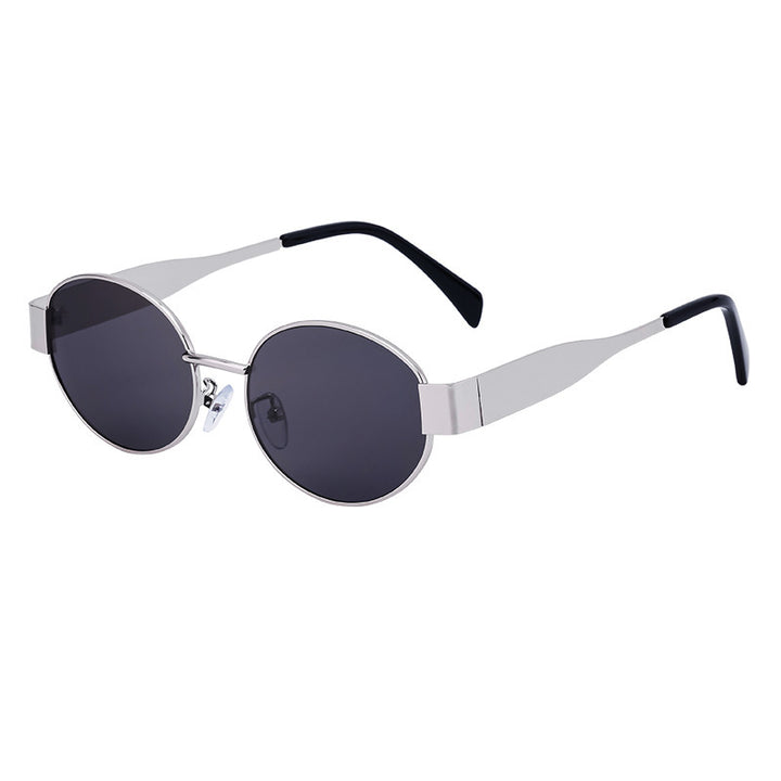 Dame moteriktig solbrille i elegant oval design Skanto