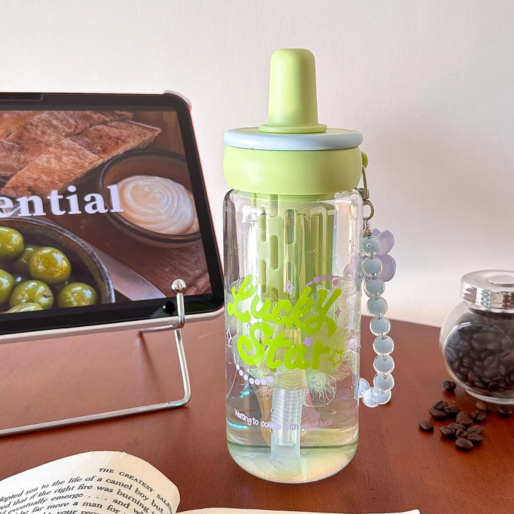 Dame kreativ drikkeflaske med integrert sugerør og nøkkelring Skanto