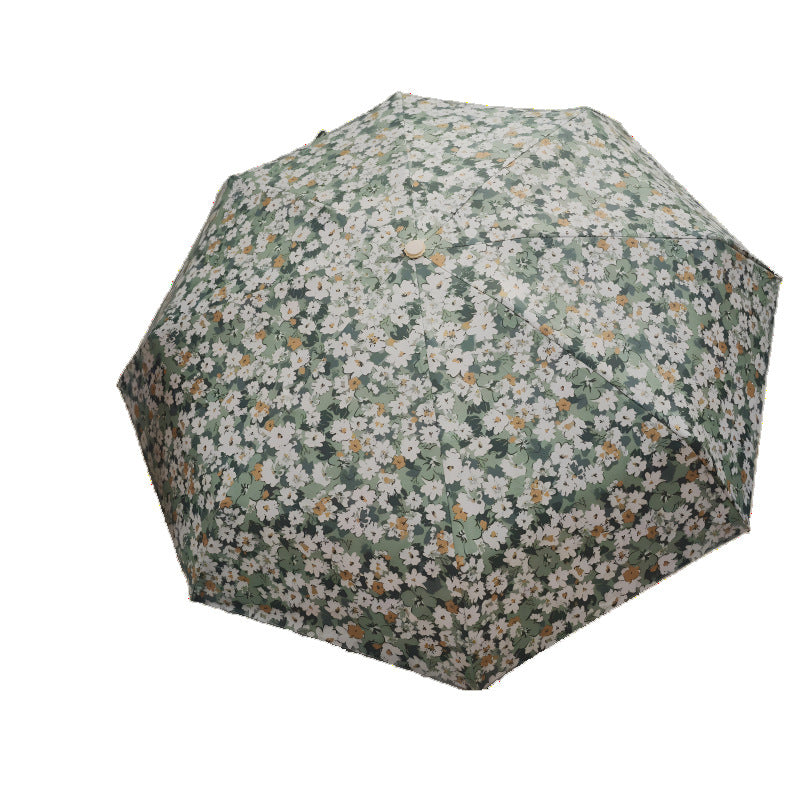 Damer Sammenleggbart paraply med elegant blomsterdesign Skanto