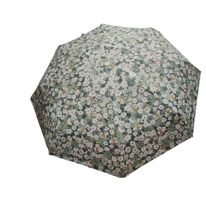 Damer Sammenleggbart paraply med elegant blomsterdesign Skanto