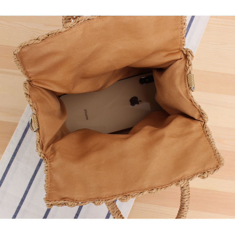 Woven natural material handbag with practical shoulder strap Skanto