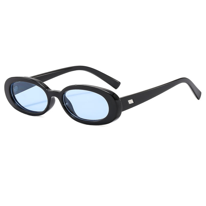Dame stilfulle solbriller med oval ramme og trendy linser Skanto