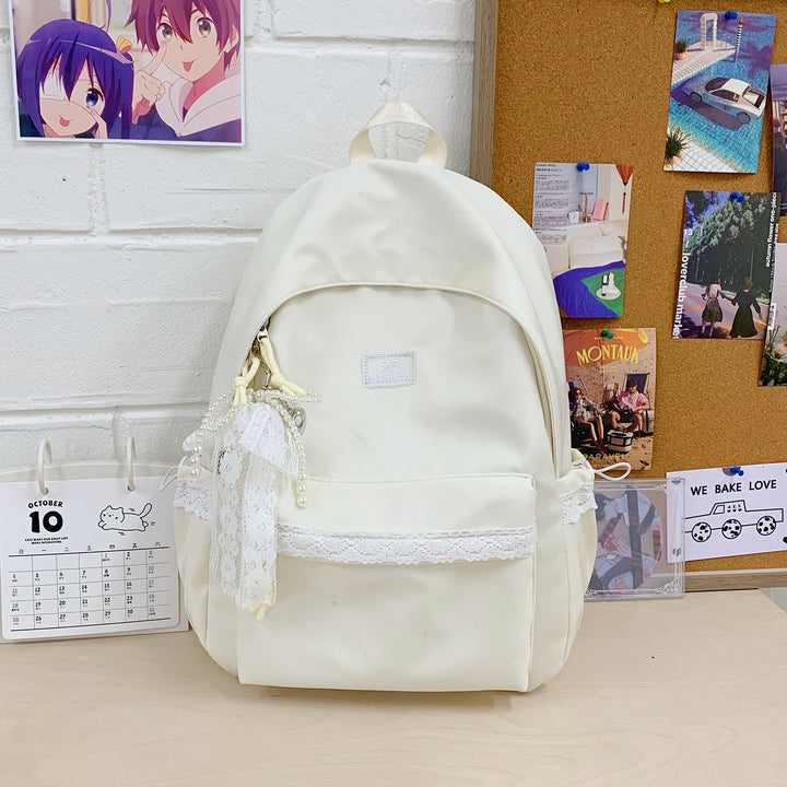 Elegant skolesekk med lacedetaljer