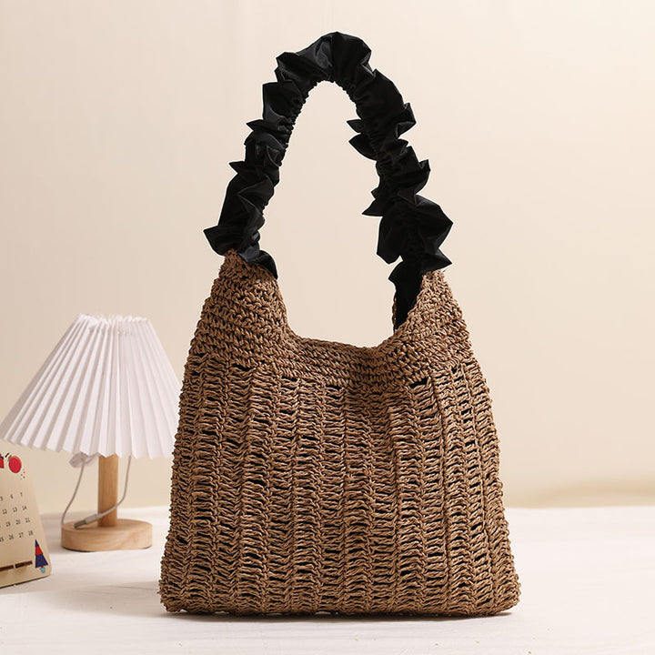 Elegant handbag with ruched decorative handle Skanto
