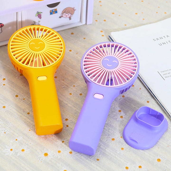 Dames bærbar USB håndvifte med innovativt smilendesign Skanto