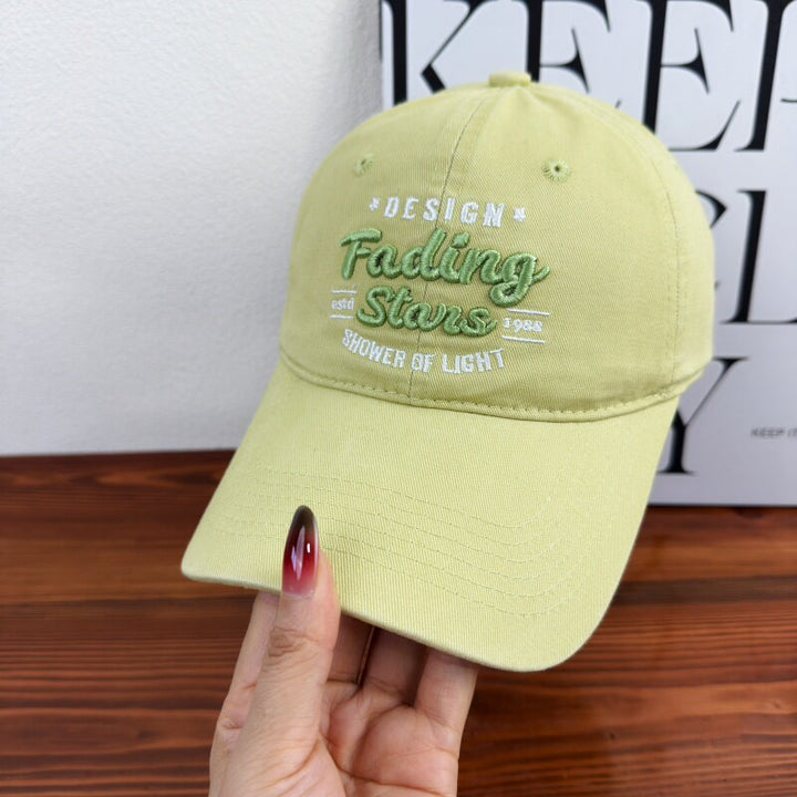 Kvinnebrodert caps med inspirerende design Skanto