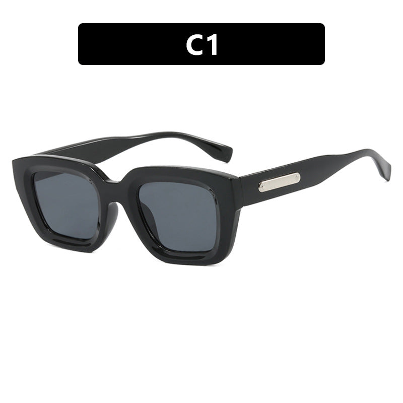 Dame kvadratisk solbrille med gjennomsiktig ramme og brune glass Skanto