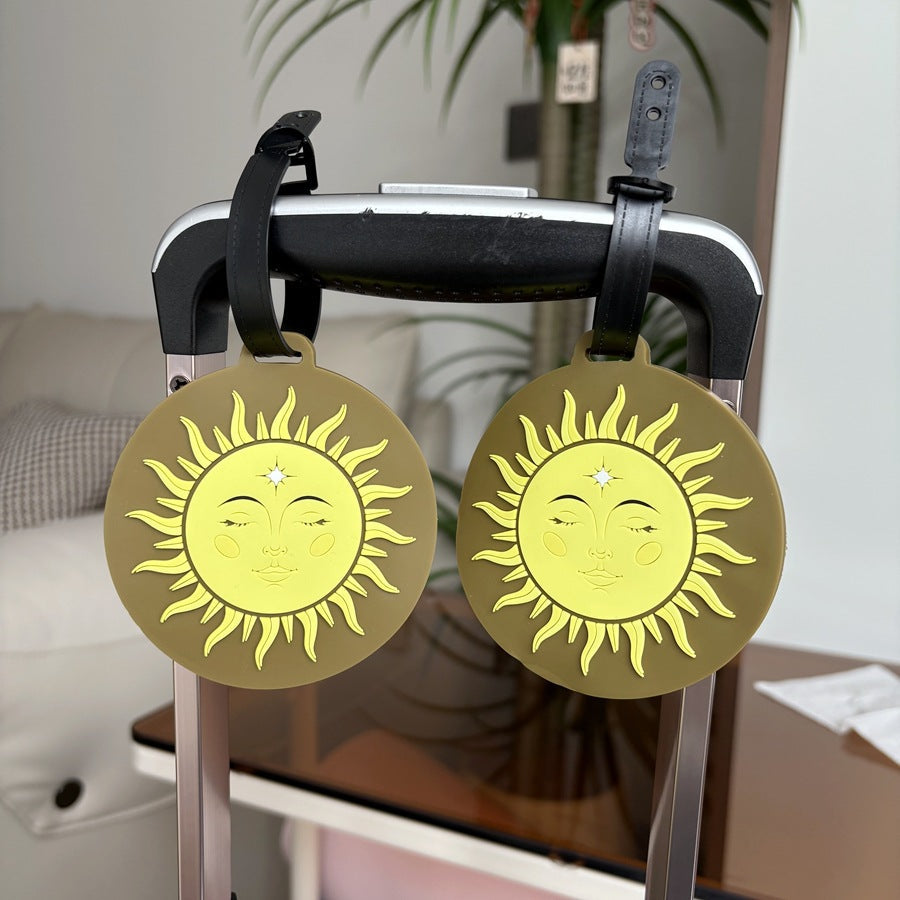 Lekenfull sol-tema bagasjelapp Skanto